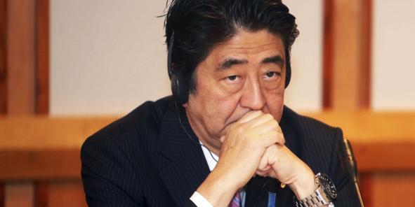 La politique de Shinzo Abe, le Premier ministre japonais, peine à convaincre (Crédit photo Reuters)