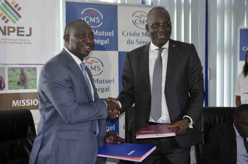 De gauche à droite Amadou Lamine Dieng directeur général de l'ANPEJ et Mohamed Ndiaye directeur général du CMS